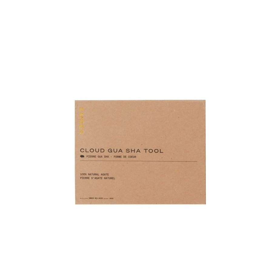 Kraft paper box with 'Cloud Gua Sha Tool' text on a white background